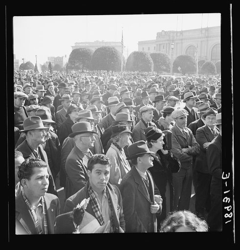 Untitled photo, possibly related to: Listening to speeches at mass meeting of Works Progress Administration (WPA) workers protesting congressional cut of relief appropriations. San Francisco, California