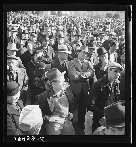Untitled photo, possibly related to: Listening to speeches at mass meeting of Works Progress Administration (WPA) workers protesting congressional cut of relief appropriations. San Francisco, California