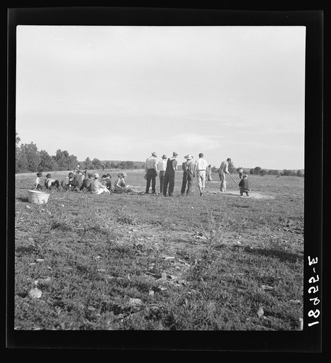 Near Mountain Home, northern Arkansas, on U.S. 62. Farmers' baseball game in the country. From this area many have gone to California to work in agriculture