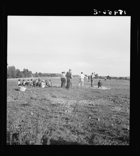 Untitled photo, possibly related to: Near Mountain Home, northern Arkansas, on U.S. 62. Farmers' baseball game in the country. From this area many have gone to California to work in agriculture