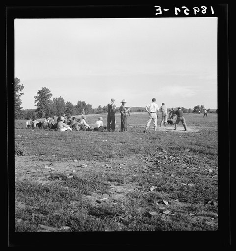 Untitled photo, possibly related to: Near Mountain Home, northern Arkansas, on U.S. 62. Farmers' baseball game in the country. From this area many have gone to California to work in agriculture