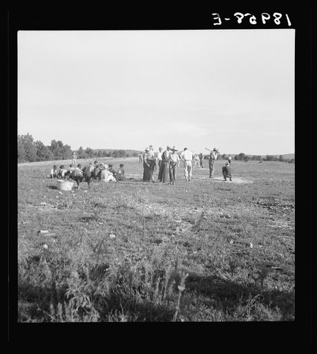 Untitled photo, possibly related to: Near Mountain Home, northern Arkansas, on U.S. 62. Farmers' baseball game in the country. From this area many have gone to California to work in agriculture