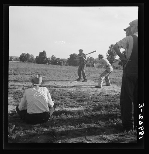 Near mountain home, northern Arkansas, on U.S. 62. Farmers' baseball game in the country. From this area many have gone to California to work in agriculture