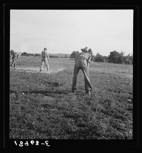 Untitled photo, possibly related to: Near Mountain Home, northern Arkansas, on U.S. 62. Farmers' baseball game in the country. From this area many have gone to California to work in agriculture