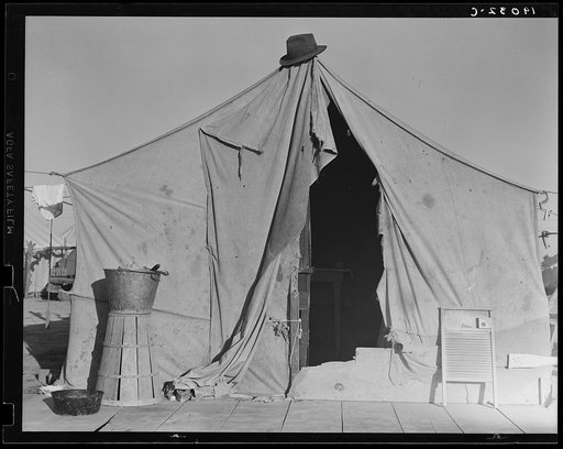 Untitled photo, possibly related to: One of a row of tents, home of a pea picker. Near Calipatria, Imperial Valley, California