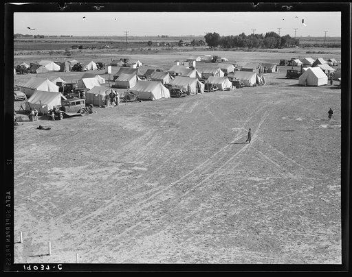 Untitled photo, possibly related to: Farm Security Administration (FSA) migrant labor camp. Calipatria, Imperial Valley, California. 155 migrant families in camp. One third had no work; two-thirds were finding part-time work harvesting spring peas, earning on average (head of family) four dollars an