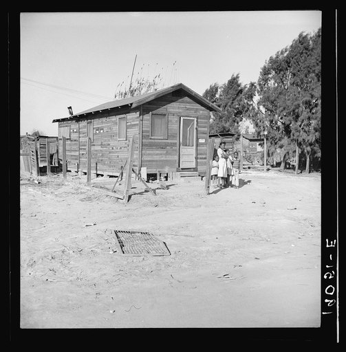 Bakersfield, Kern County, California. Housing for Negroes in a new district on the edge of town. A rapidly growing community of colored people, mostly from Texas, some from Oklahoma. Rent of this house without plumbing twelve dollars per month