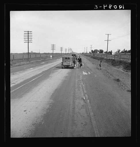 Passing motorist gives walking family of seven a lift to the next town. See 19075. California