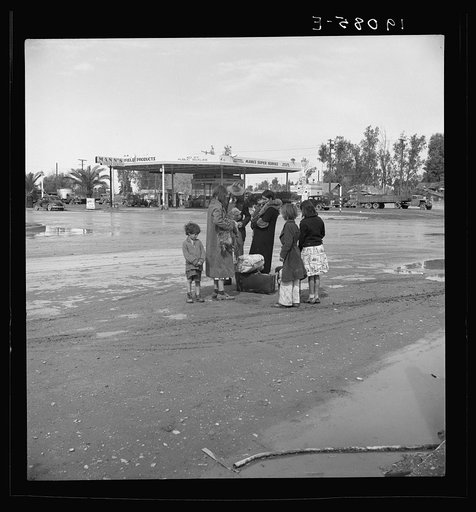 Untitled photo, possibly related to: After a lift of five miles by a passing motorist, the family of homeless, walking people are left at the edge of the next town