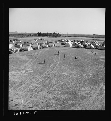 Untitled photo, possibly related to: Farm Security Administration (FSA) migratory labor camp, 155 migrant families in camp. One-third had no work, two-thirds were finding part time work harvesting spring peas, earning on average (head of family) of four dollars twenty cents per week