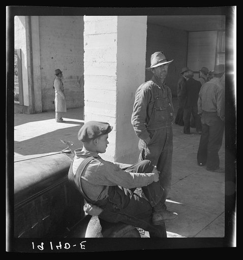 Pea pickers waiting at Farm Security Administration (FSA) office for issue of surplus commodities. Calipatria, California