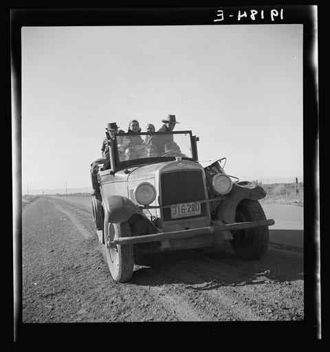 Eight related persons just arriving in this roadster from Texas. In search of employment as pea pickers. On U.S. 80. Imperial Valley, California