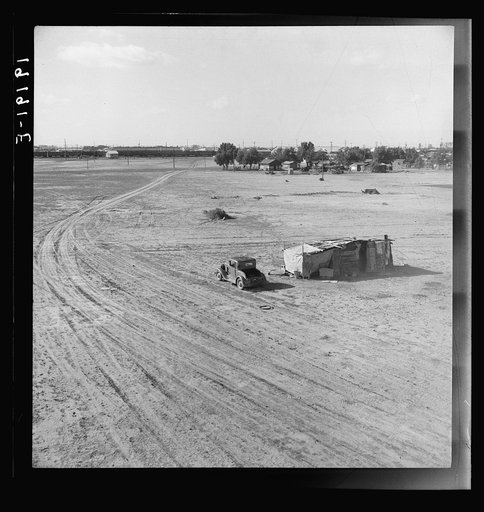 Home of Mexican family. Migratory workers. Across the road from the Farm Security Administration (FSA) migratory labor camp (emergency). Calipatria, Imperial Valley, California
