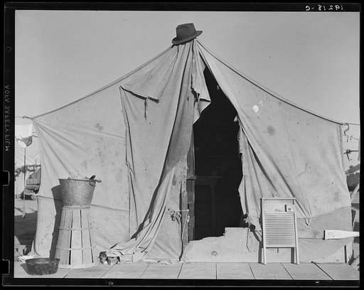 One of a row of tents, home of a pea picker. Near Calipatria, Imperial Valley, California