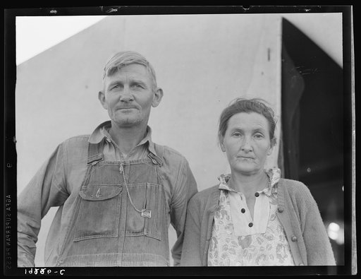 In Farm Security Administration (FSA) migratory labor camp. Family, mother, father and eleven children, originally from Oklahoma, where he had been a tenant farmer. Came to California in 1936 after drought. Since then have been traveling from crop to crop in California following the harvest. Six of 