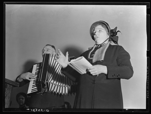 Adjutant and his wife sing. Salvation Army, San Francisco, California