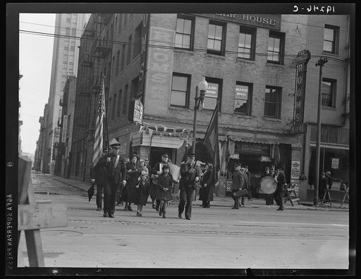 Salvation Army, San Francisco, California. Regular Sunday morning meeting. (Meeting held regularly Sunday, Tuesday and Thursdays.) Marching up street to the meeting