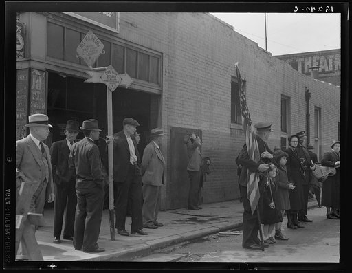 Salvation Army, San Francisco, California. Men come out of adjacent bar to watch, and return to the bar. (San Francisco is said to drink more whiskey per capita than any other city in the United States)