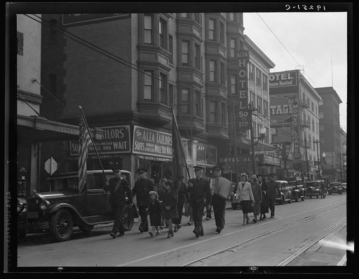 Salvation Army, San Francisco, California. Regular Sunday meeting. (Meeting held regularly Sundays, Tuesdays, Thursdays.) Marching up the street to the meeting