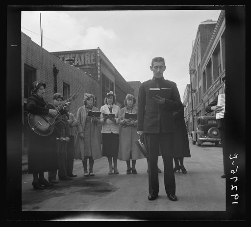 Untitled photo, possibly related to: At Minna Street the army forms a semi-circle and sings to attract a crowd. Salvation Army, San Francisco, California
