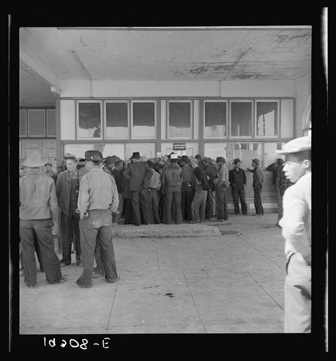 Outside Farm Security Administration (FSA) grant office during the pea harvest. Calipatria, California. During the spring of 1938, for the first time the labor surplus had grown so large that relief grants were necessary even during the peak of harvest
