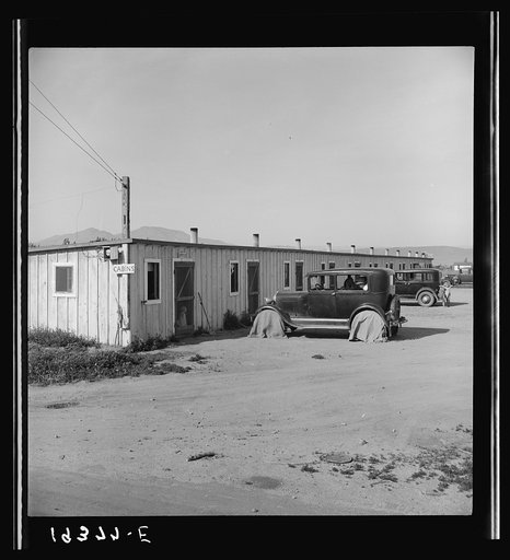 Untitled photo, possibly related to: Arkansawyers auto camp. Ten cabins which rent for ten dollars a month with iron bed and electric light, one room. Greenfield, Salinas Valley, California