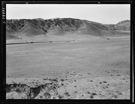 Untitled photo, possibly related to: U.S. 99 on ridge over Tehachapi Mountains. Heavy truck route between Los Angeles and San Joaquin Valley over which migrants travel back and forth