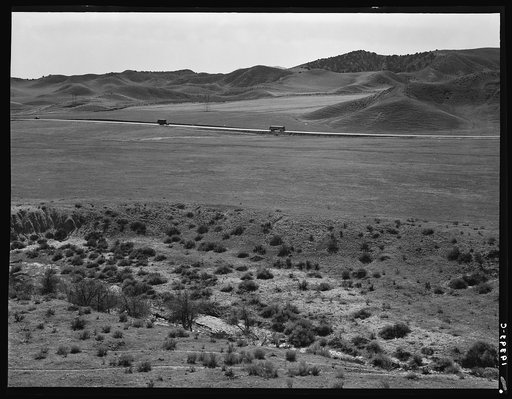 U.S. 99 on ridge over Tehachapi Mountains. Heavy truck route between Los Angeles and San Joaquin Valley over which migrants travel back and forth