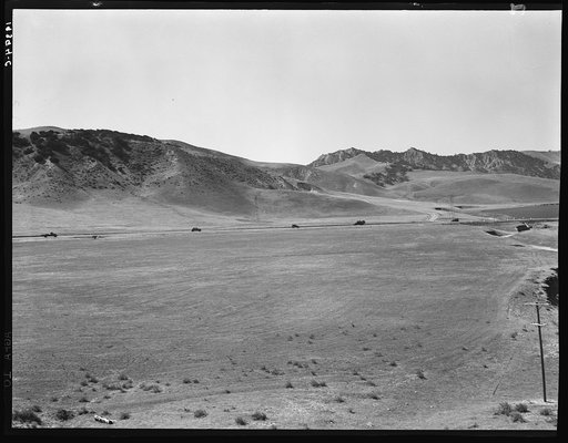 U.S. 99 on ridge over Tehachapi Mountains. Heavy truck route between Los Angeles and San Joaquin Valley over which migrants travel back and forth
