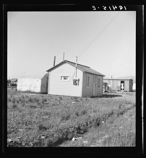 Housing for rapidly growing settlement of lettuce workers on fringes of town. Salinas, California