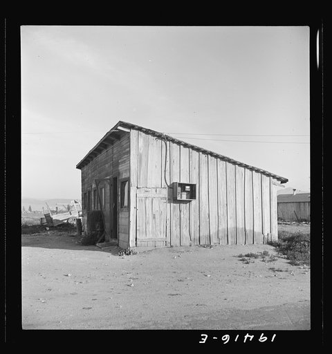 Cabin which rents for ten dollars a month in Arkansawyer's auto camp. Greenfield, California