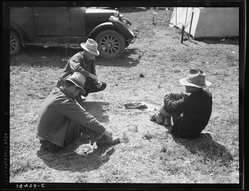 Idle migrants. Foothills north of San Jose, California. "If the sun shines tomorrow and nothin' happens, we'll pick, And they've got orders from the law, all of us guys who don't want to work here to move us out."