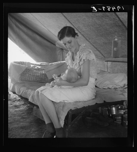 Untitled photo, possibly related to: Young migrant mother with six weeks old baby born in a hospital with aid of Farm Security Administration (FSA) medical and association for migratory workers. She lives in a labor contractors camp near Westley, California. "I try to keep him eatin' and sleepin' re