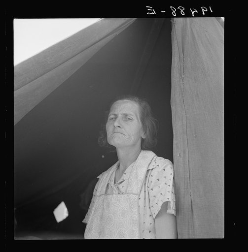 Migrant woman from Arkansas living in contractor's camp near Westley, California. She would prefer to live in a government camp, but the contractor system prevents, because of control over allocations of work
