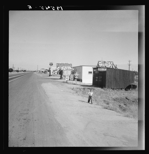 Between Tulare and Fresno, California. Along the highway U.S. 99 at Highway City