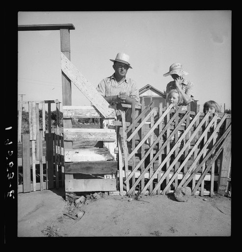 Highway City, California, near Fresno. See general caption. Family from Oklahoma; have been in California for six years, have been migratory workers now on Works Progress Administration (WPA) from which they may be cut off at the opening of the 1939 harvest. Their house represents one of many simila