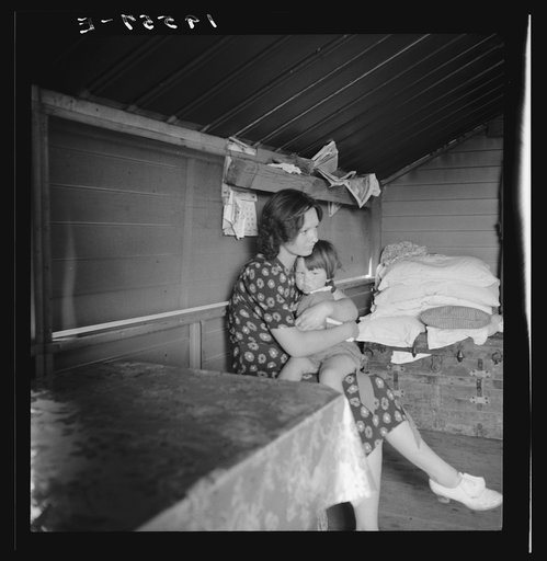 Untitled photo, possibly related to: Tulare County, California. In Farm Security Administration (FSA) camp for migratory agricultural workers. Mother with sick baby awaits arrival of FSA camp resident nurse