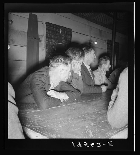 Farm Security Administration (FSA) camp for migratory agricultural workers. Farmersville, California. Meeting of the camp council