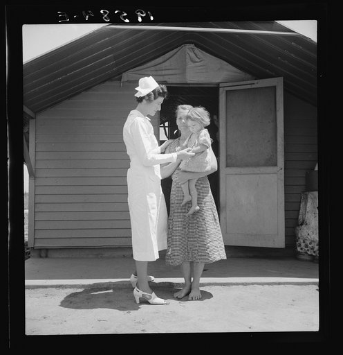 Untitled photo, possibly related to: Farm Security Administration camp (FSA). Farmersville, Tulare County. Shows resident nurse come to visit family where there is sick baby