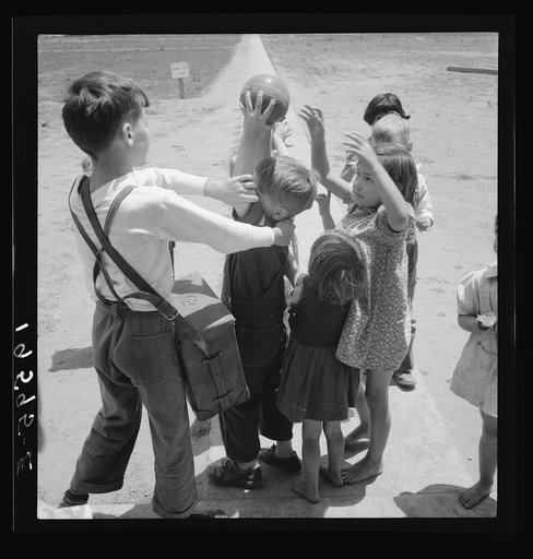 Untitled photo, possibly related to: Tulare County. Farm Security Administration (FSA) camp for migrant agricultural workers. Nursery school, showing migrant children playing. California