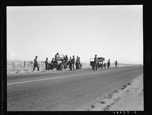 Untitled photo, possibly related to: Near Los Banos, California. Migratory agricultural workers. Cotton hoers leave the field at end of the day. Wages twenty cents an hour