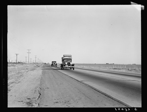 Between Tulare and Fresno. Migrants on the road. California. See general caption