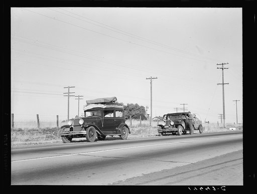 Between Tulare and Fresno. Two families originating from Independence, Kansas, on U.S. 99. Started out from Fresno that morning for work cotton chopping