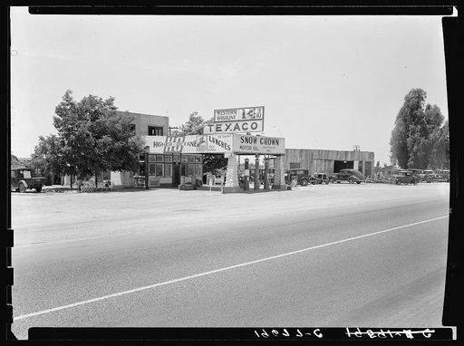 Near Kingsburg. Small independent gas stations litter the highway. California