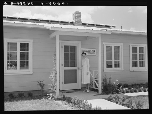 Tulare County, California. Farm Security Administration (FSA) camp for migratory agricultural workers at Farmersville. Resident nurse and clinic building of Agricultural Workers' Health and Medical Association
