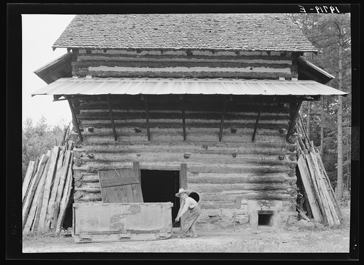 Untitled photo, possibly related to: Tobacco barn ready for "putting in". Person County, North Carolina