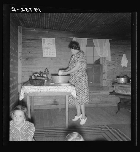 Untitled photo, possibly related to: Wife of tobacco sharecropper in kitchen of home. Person County, North Carolina