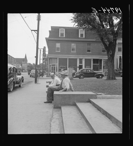 Farmers idling around the courthouse. Roxboro, North Carolina