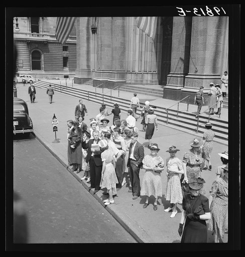 Fifth Avenue at Saint Patrick's Cathedral. Waiting for an uptown bus. New York City