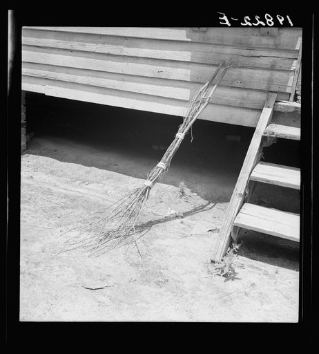 Untitled photo, possibly related to: Kitchen door of Zollie Lyon's house. Note brushbroom. Wake County, North Carolina